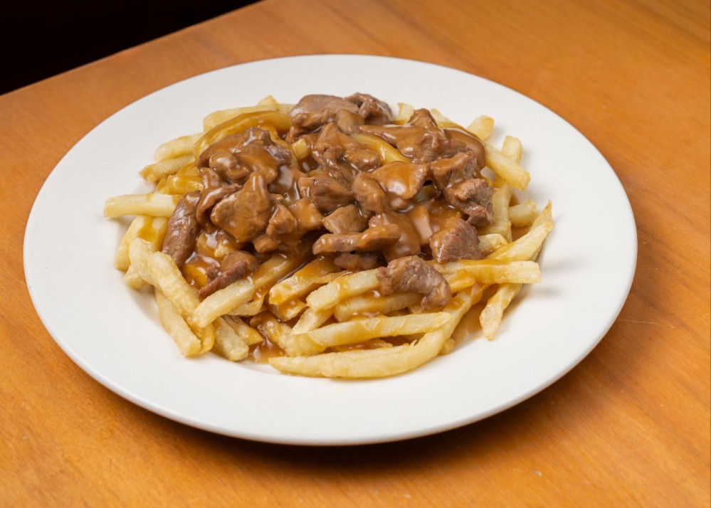 MEDIO LOMO CON PAPAS 